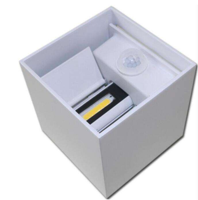 El sensor de movimiento al aire libre 12W ajustable hacia arriba y hacia abajo de la lámpara de pared de aluminio decoran la luz de pared LED